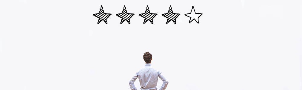 Man looking at 4/5 stars filled in