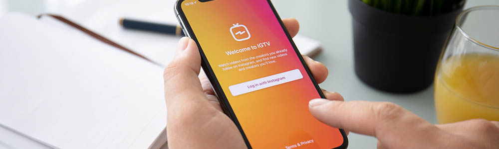 iPhone with IGTV intro on the screen